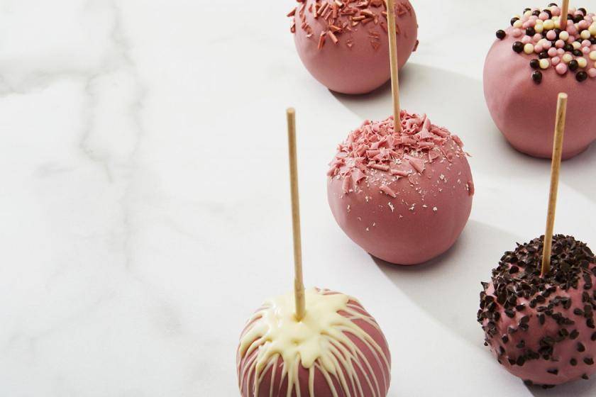 APPLE ON A STICK WITH RUBY GLAZE