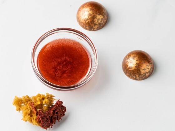 A sea sponge, shimmer color, and decorated bonbons